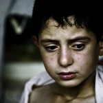 0030_zoriahphotojournalistwarphotographer_zoriah_photographer_iraq_irak_boy_fear_war_raid_army_us_military